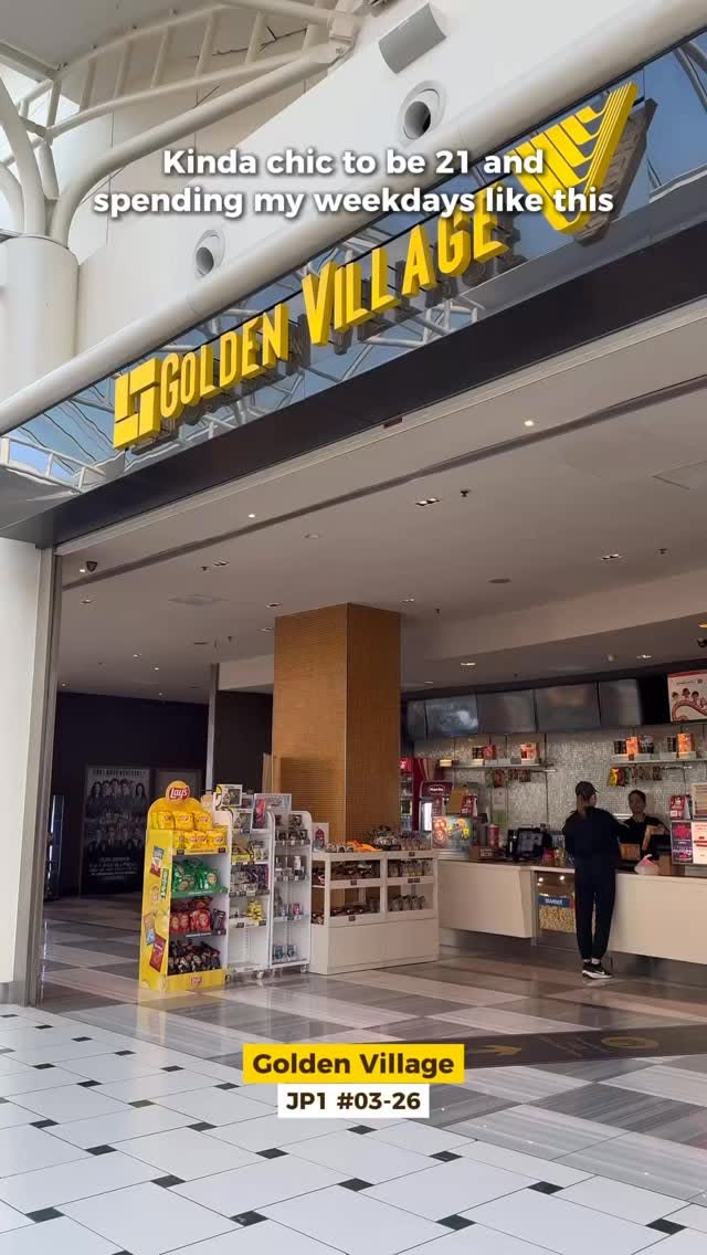 Moviegoers with tickets and shopping bags at Golden Village Jurong Point