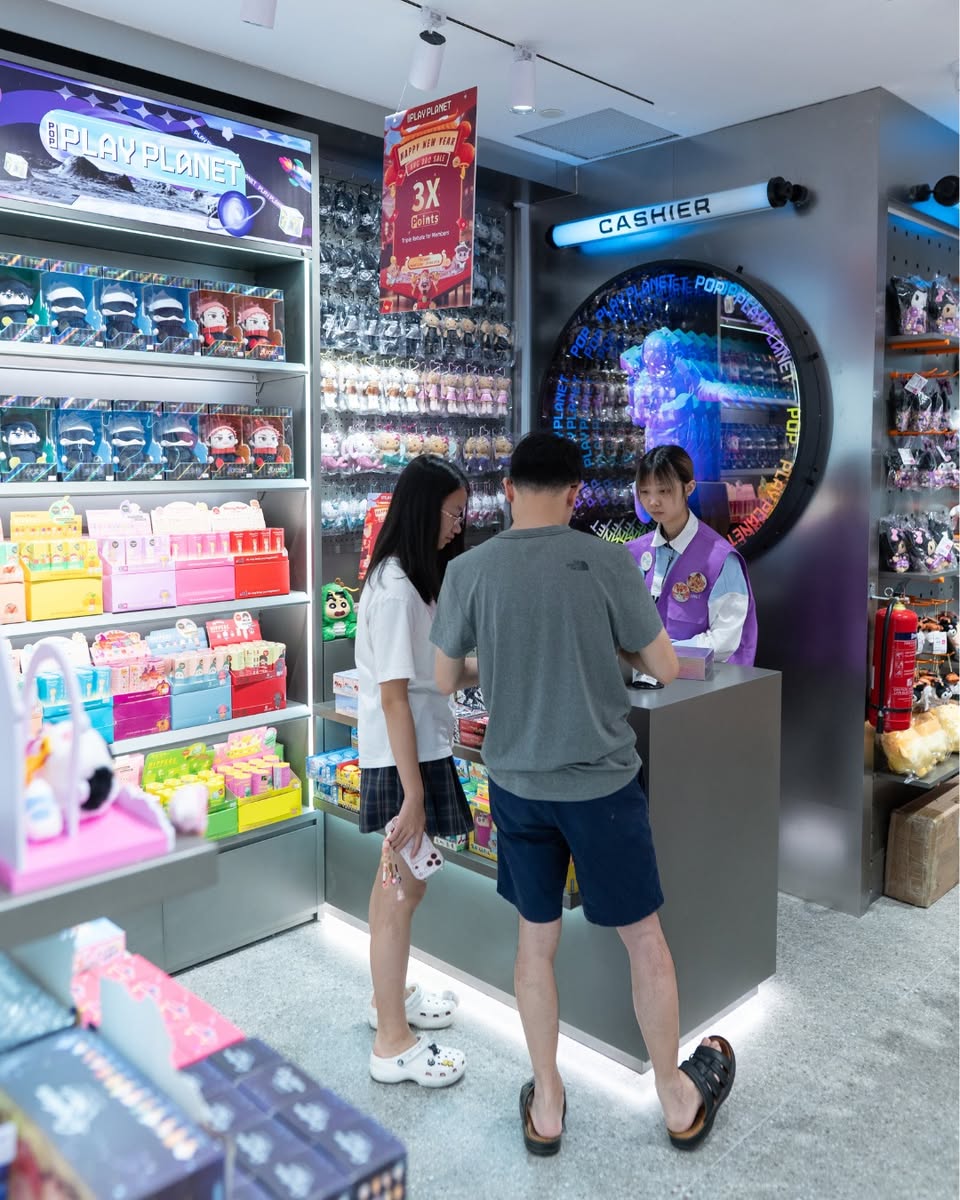 Shelves filled with various blind boxes and mystery toys