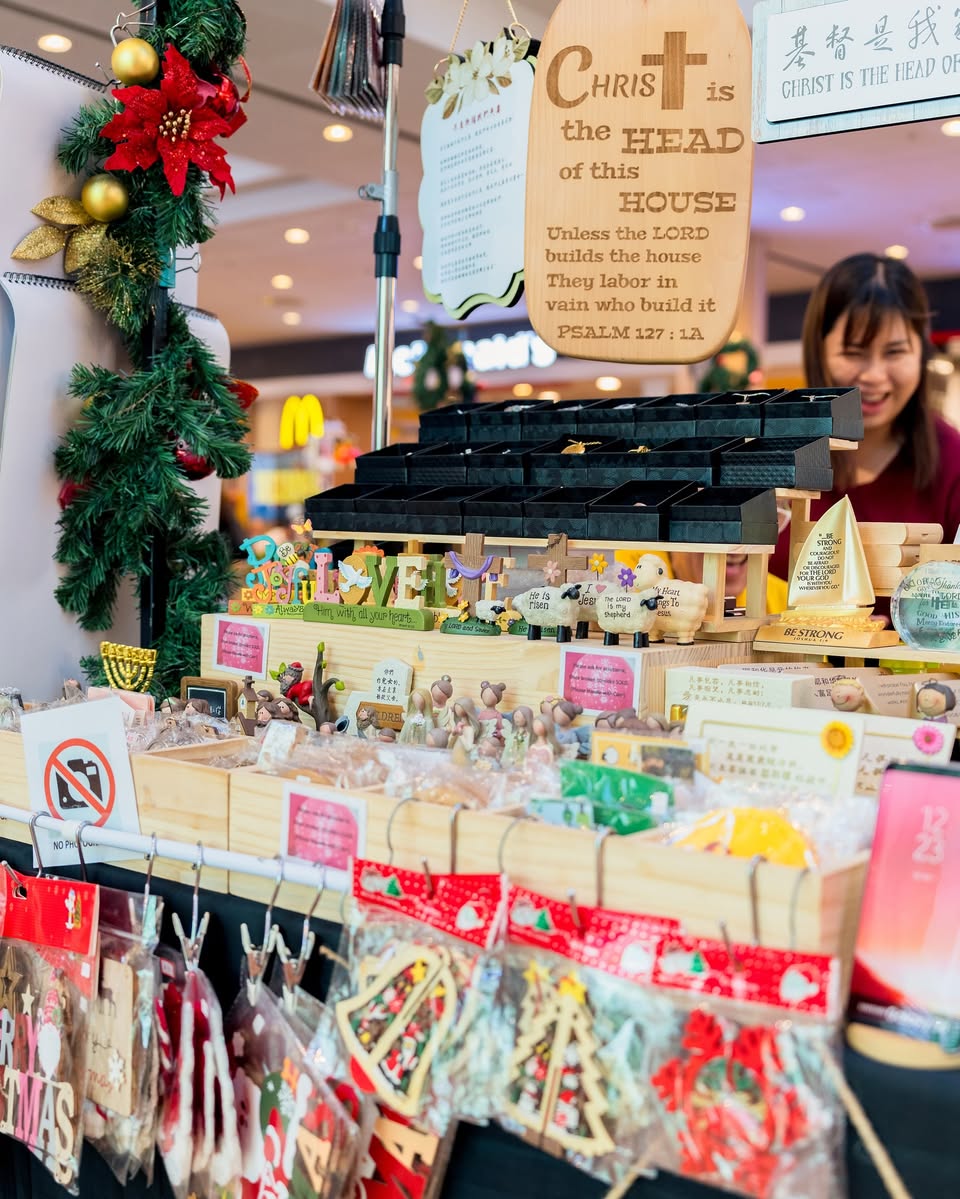 An overview of the bustling Jurong Point market area, filled with visitors.