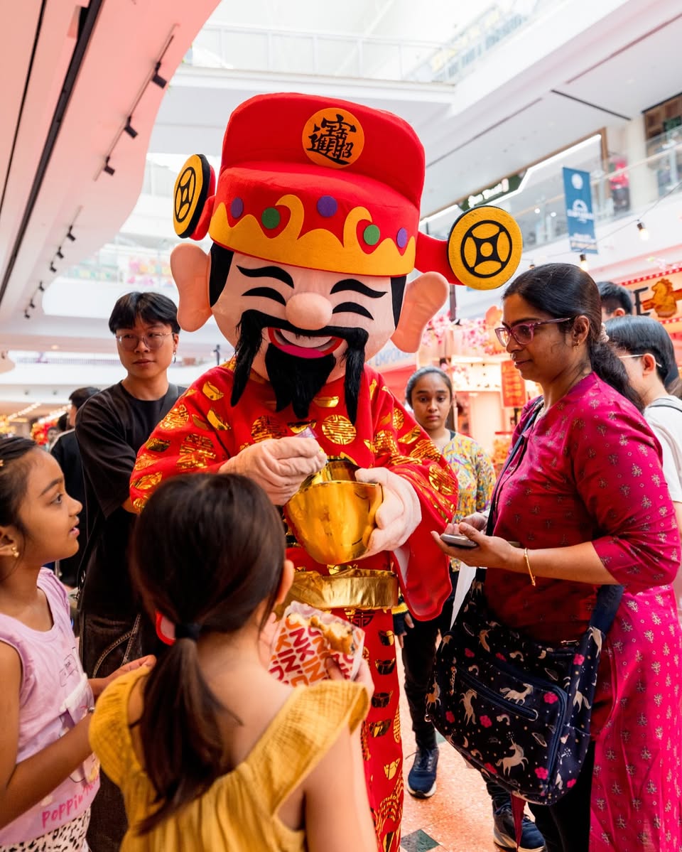 Shoppers capturing photos during the festive event