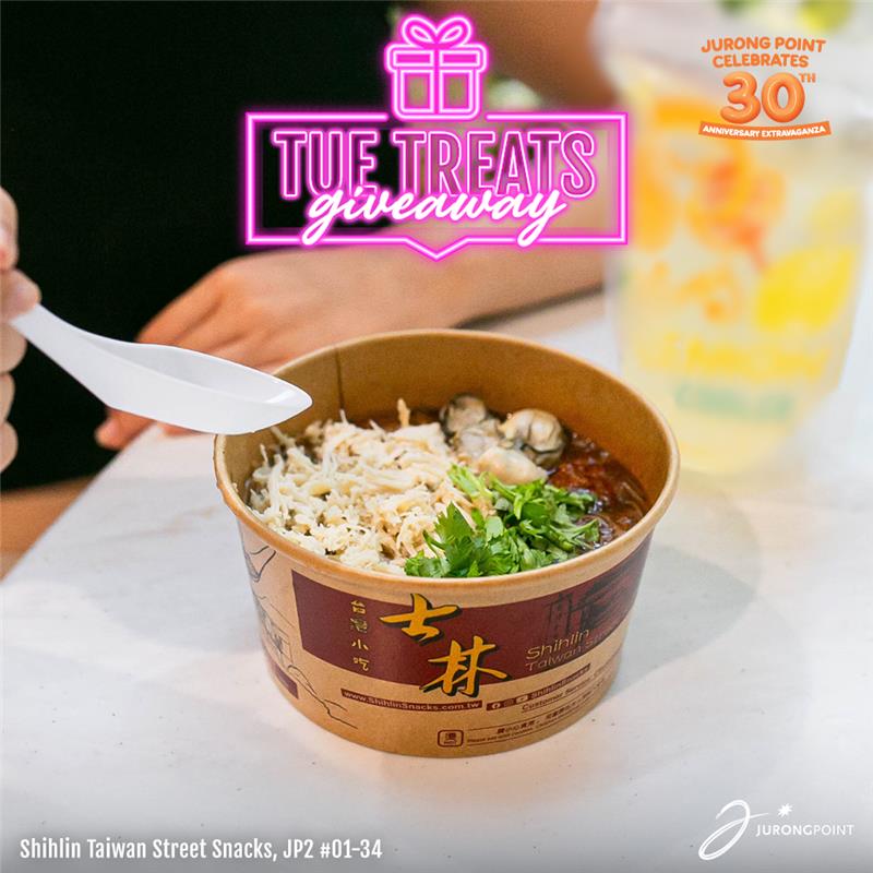A warm bowl of Oyster Mee Sua, a classic Taiwanese noodle soup dish with oysters and silky vermicelli, garnished with fresh herbs.