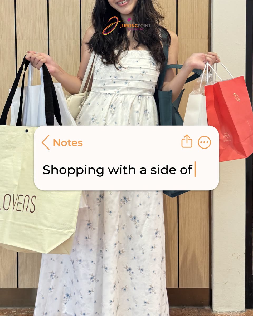Shopper with multiple bags at Jurong Point