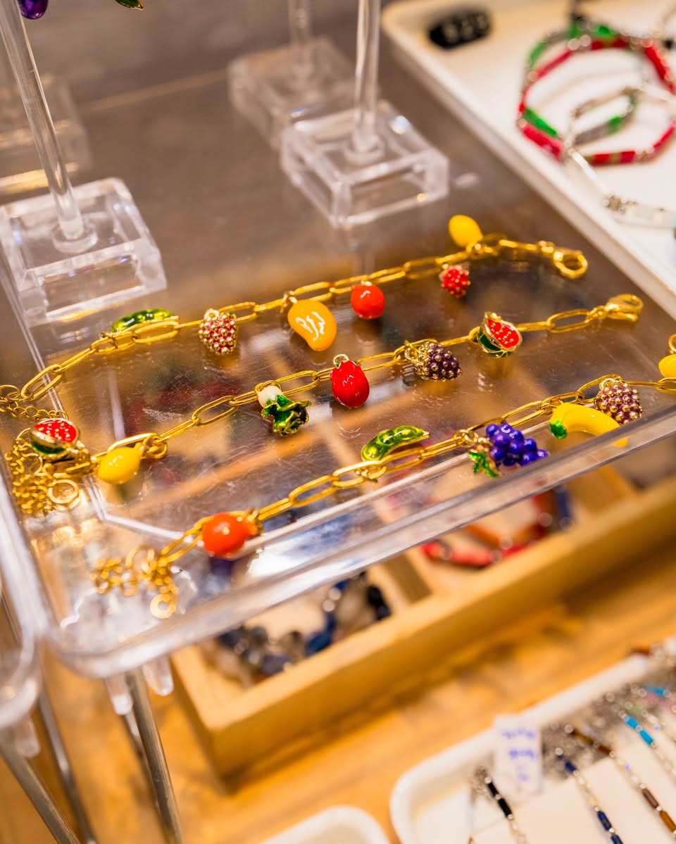 Gold chain fruit charm bracelets at Crafters Market