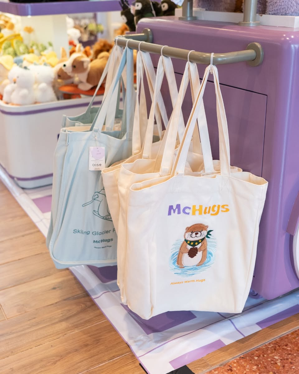 A collection of colorful McHugs plushies on display at Jurong Point