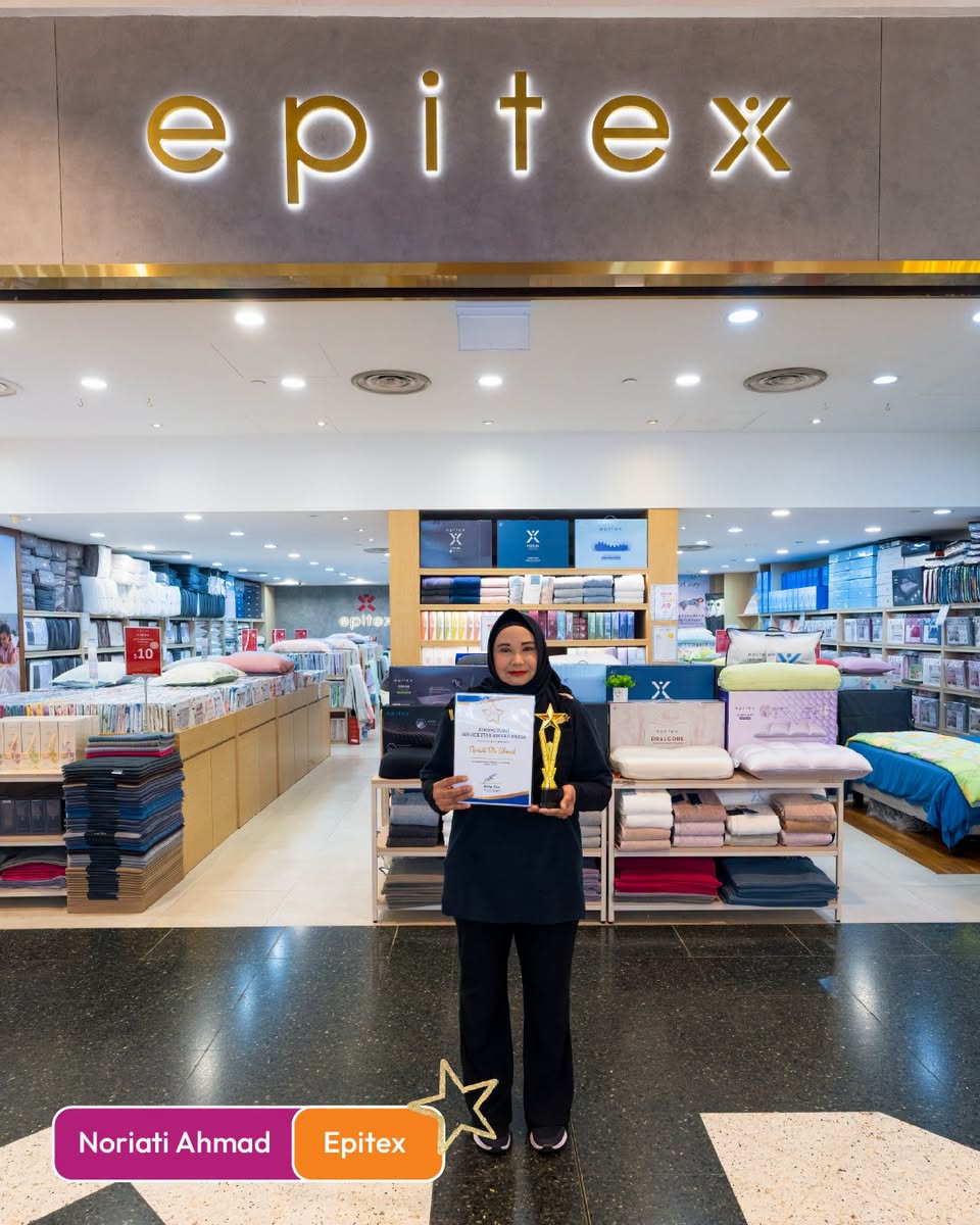 Noriati Ahmad from Epitex holding Certificate of Appreciation