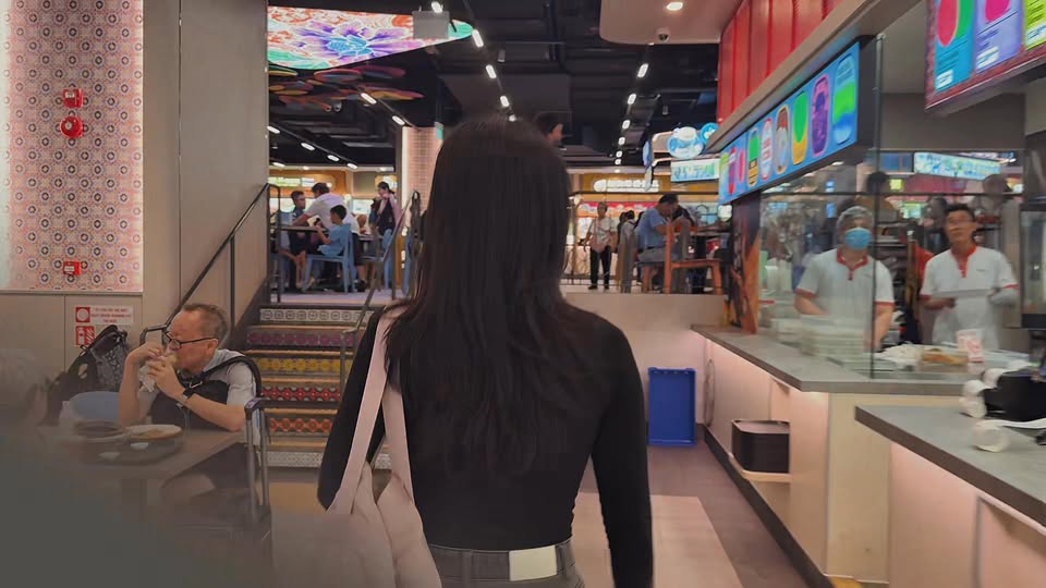 Jurong Point food court and hawker stalls with seated diners and food vendors