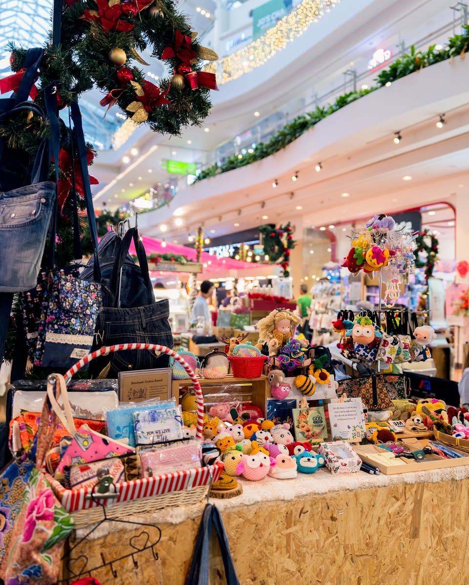 A vibrant scene from Jurong Point's festive market, showcasing various stalls.