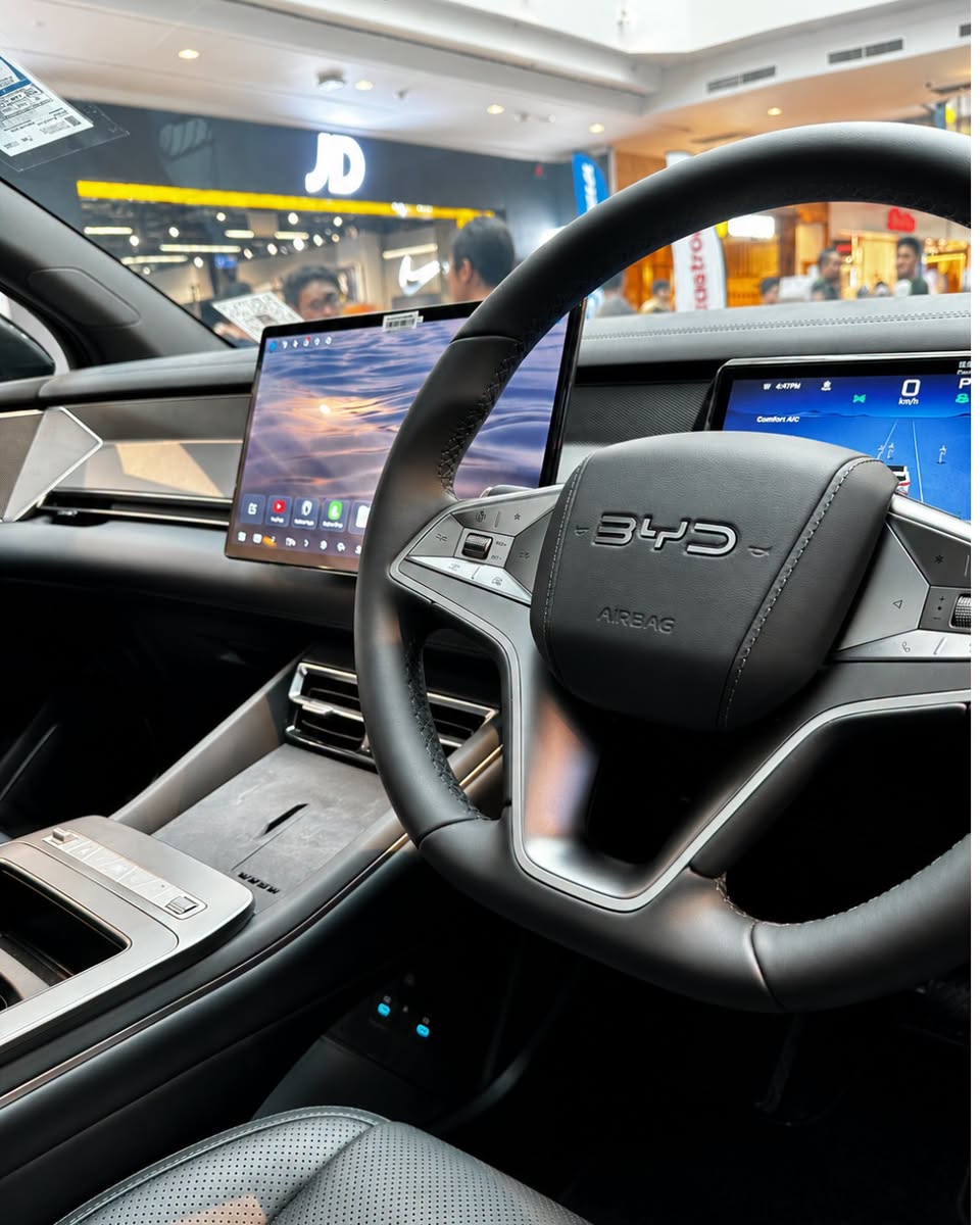 BYD vehicle interior with dual-screen dashboard at Jurong Point